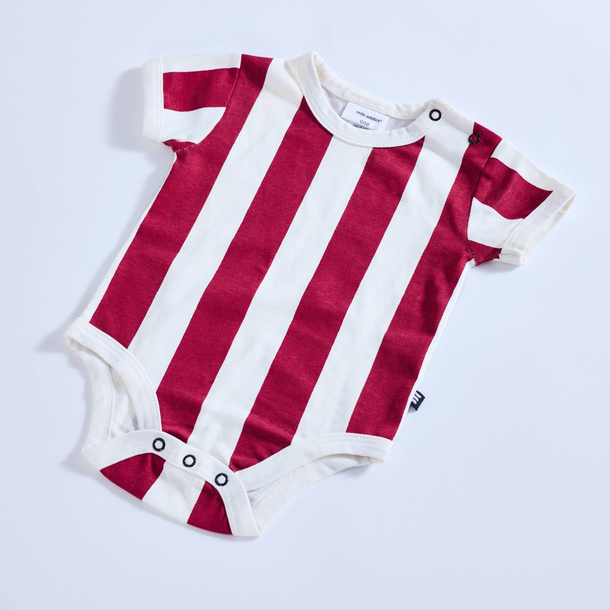 Milk Addict Bold Stripe Bodysuit in Dark Rust