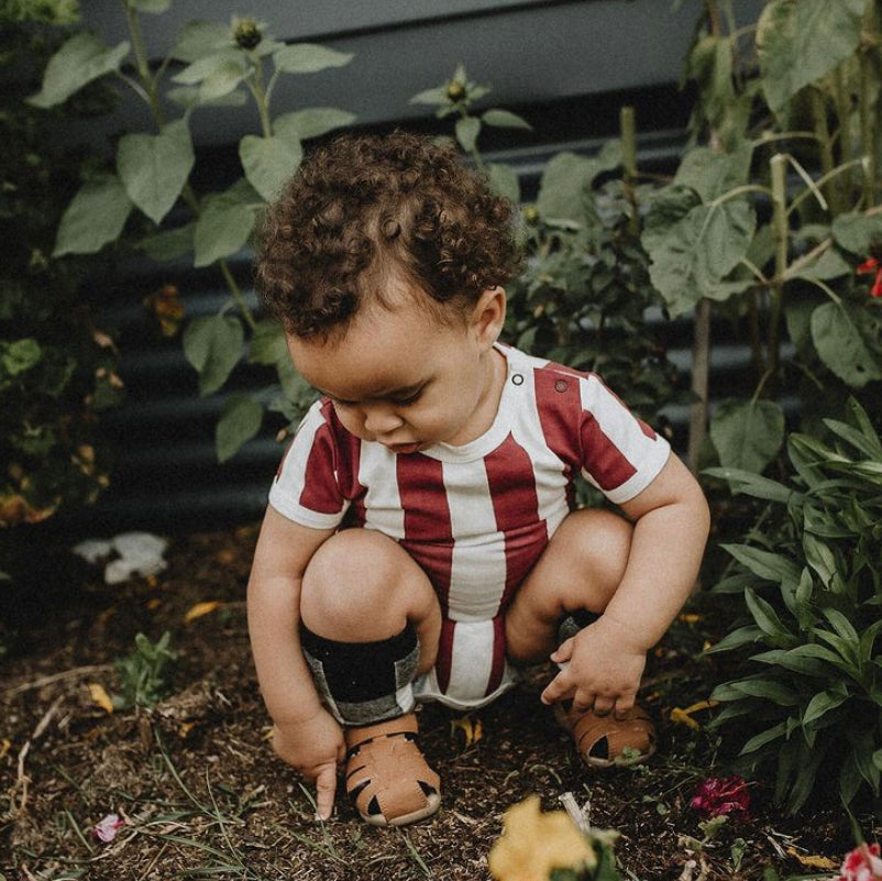 Milk Addict Bold Stripe Bodysuit in Dark Rust